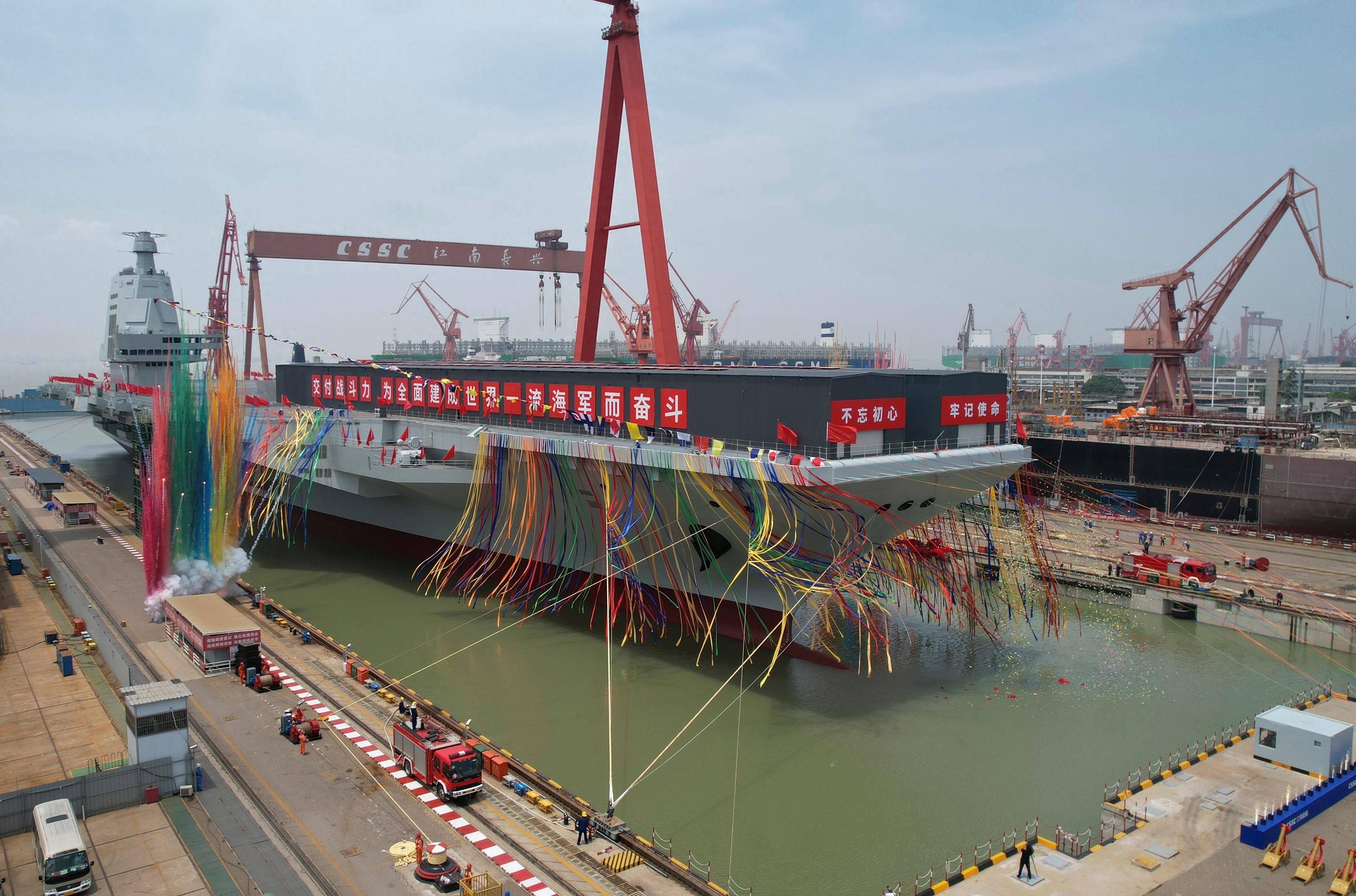 解放軍確認(rèn)建造完成第四艘航母，展現(xiàn)國家力量與海洋雄心，解放軍完成第四艘航母建造，彰顯國家海洋雄心與力量